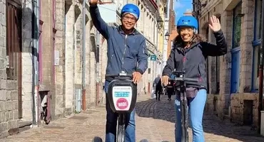 couple Segway Lille rue pavée